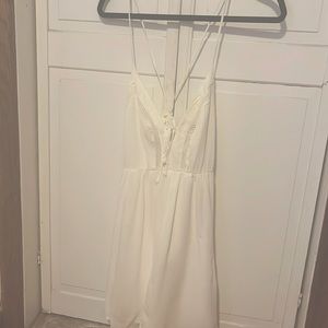 White mini flowy Boho dress with cross straps in the back